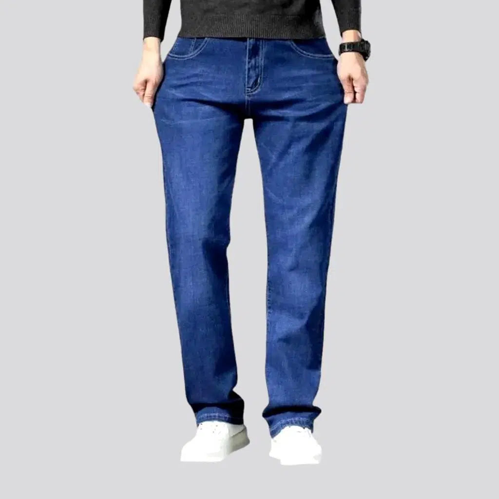 Stretchy men's mid-waist jeans